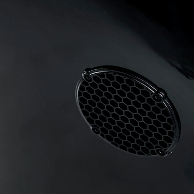 Honeycomb ventilation grille covering a Cold Fusion cooling fan